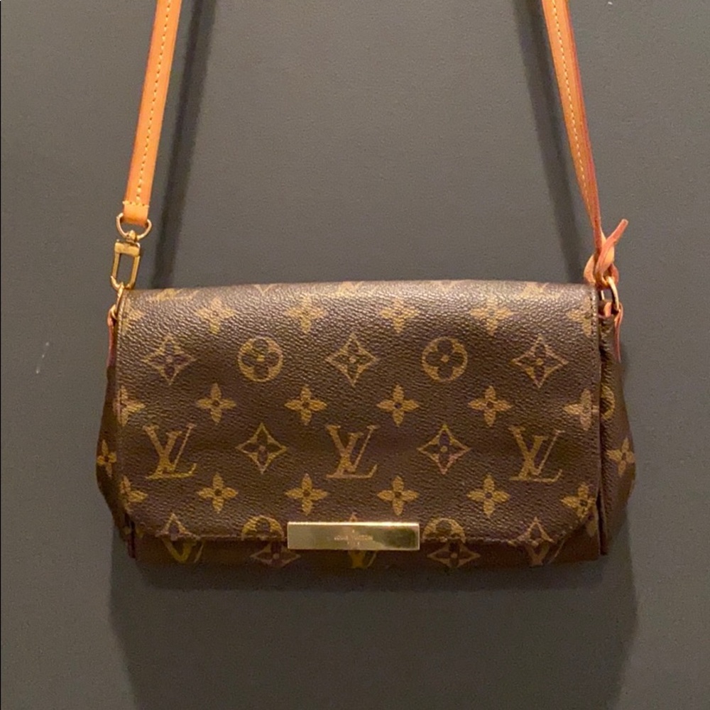 LV small cross body bag.